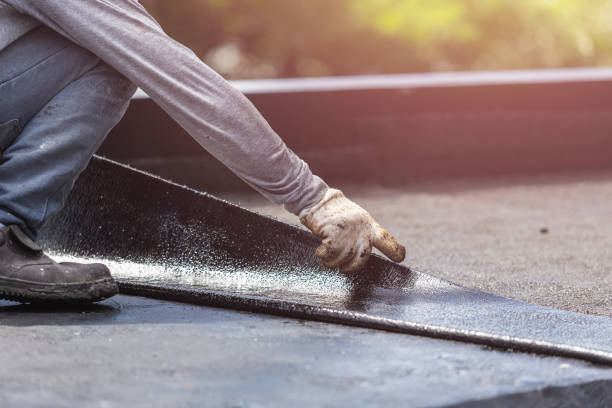 Professional Exterior Waterproofing technician working in Dimondale, MI